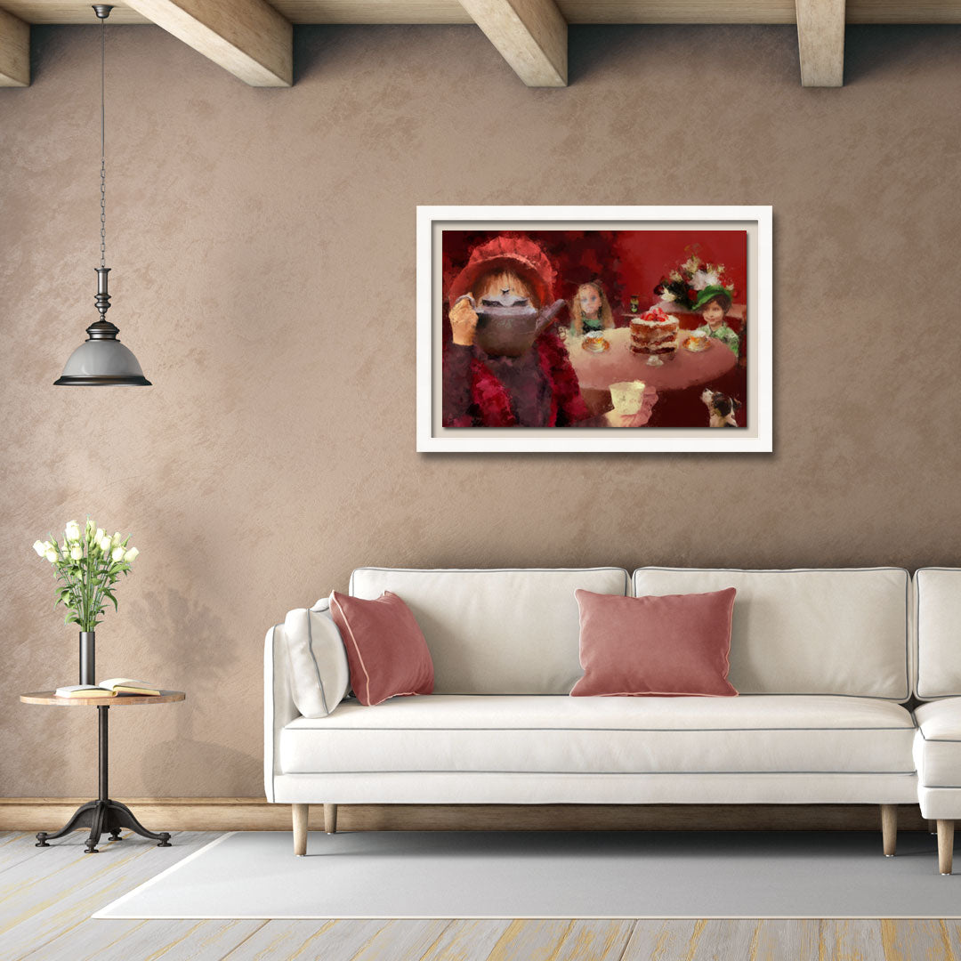 A framed art print Green Tea and Cake by Anna-Marie Buss, displayed on a textured beige wall above a modern cream sofa in a styled living room.