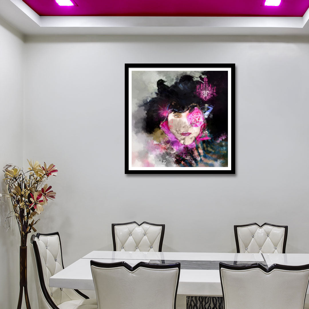 Framed abstract art piece on a wall above a dining table with chairs.