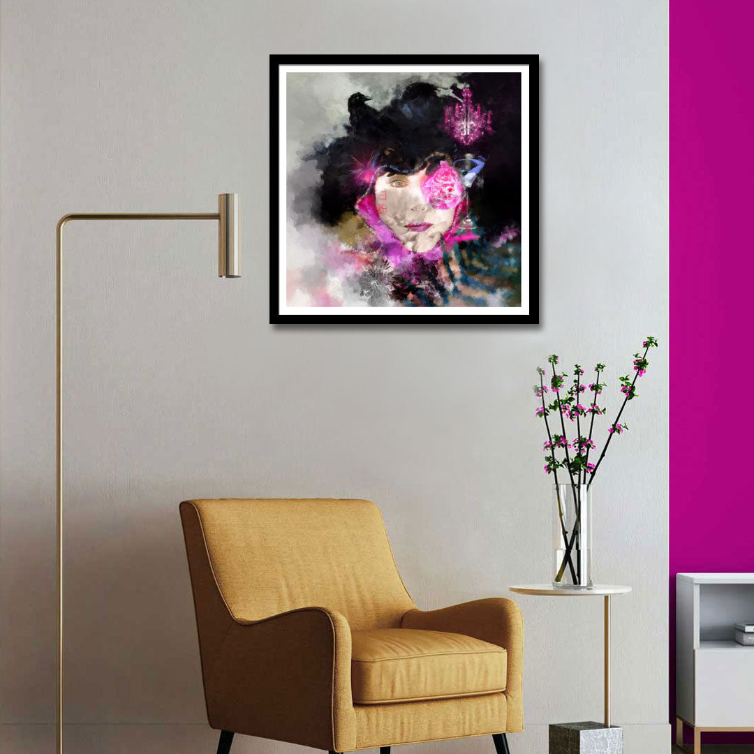 Framed abstract art on a wall above a yellow armchair with a pink accent.